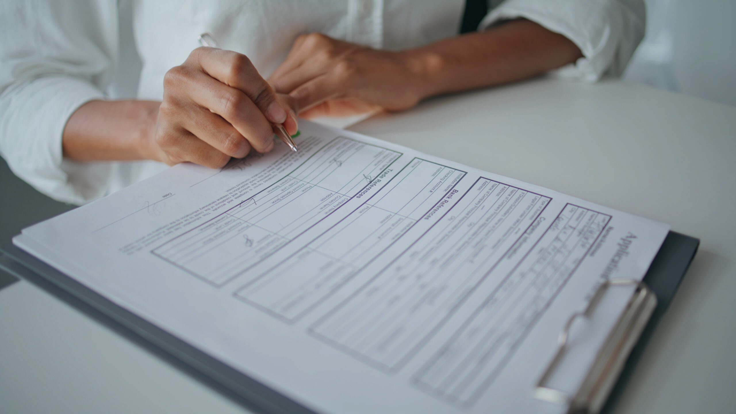 closeup patient writing form in healthcare clinic woman hand point document help with sbi 349981184